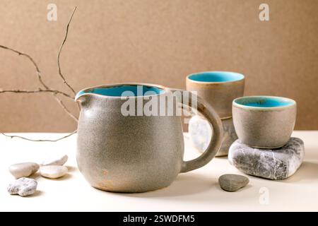 Set of empty grey ceramic cups Stock Photo