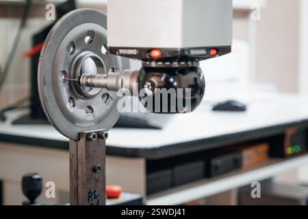 Precision Measurement of Industrial Part Using Advanced CMM Technology for Quality Control and Dimensional Analysis Stock Photo