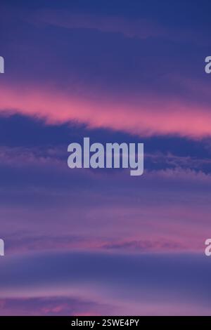 An aesthetic background with soft pink clouds in the sky Stock Photo ...