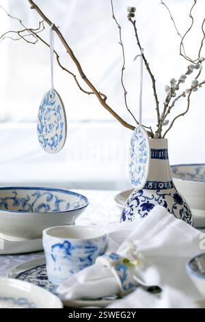 Easter table setting with empty craft ceramic tableware Stock Photo