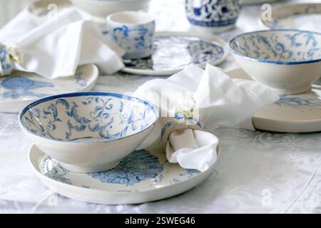 Easter table setting with empty craft ceramic tableware Stock Photo