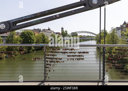 Love locks on the Chain Bridge over the Main-Danube Canal, in the background the Luitpold Bridge and the Church of the Redeemer, Bamberg, Bavaria, Ger Stock Photo
