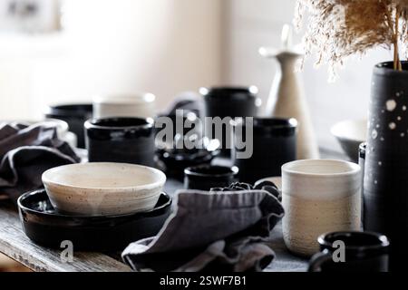 Rustic table setting with empty craft handmade ceramic tableware Stock Photo