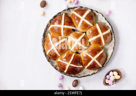 Homemade Easter traditional hot cross buns on ceramic dish Stock Photo