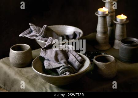 Rustic table setting with craft ceramic tableware Stock Photo