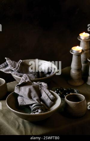 Rustic table setting with craft ceramic tableware Stock Photo