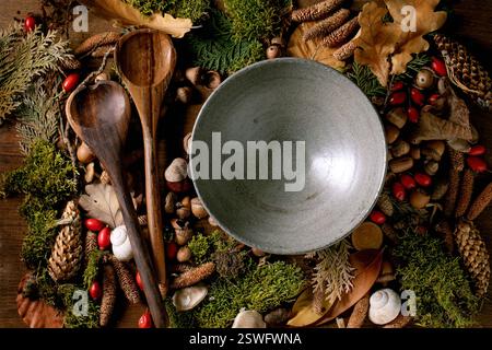 Empty plate over ambiance magic autumnal forest background Stock Photo