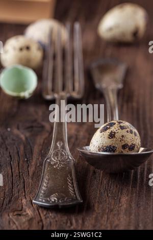 Easter table setting with quail eggs Stock Photo