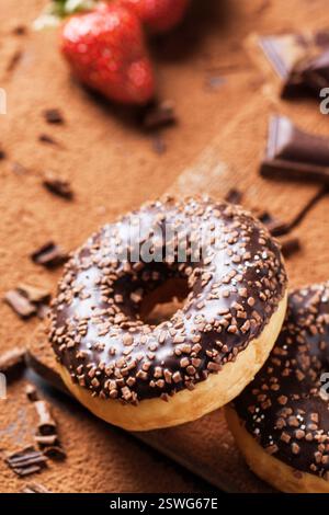 Donuts with fresh strawberries and chocolate Stock Photo