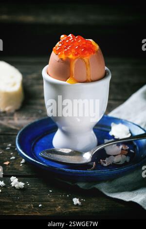 Soft-boiled egg with red caviar Stock Photo