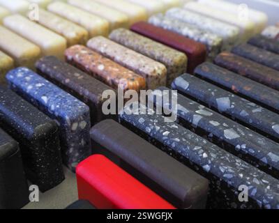 Samples of acrylic stone. Samples of acrylic stone for the production of countertops. Stock Photo