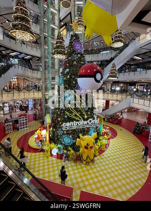 Bangkok, Thailand - Jan 3, 2024: Inside the centralworld shopping mall in Bangkok featuring a large Christmas tree. Stock Photo