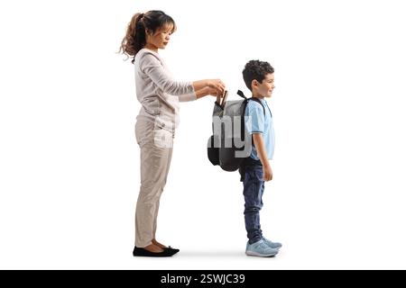 Asian woman helping a boy with school backpack isolated on white background Stock Photo