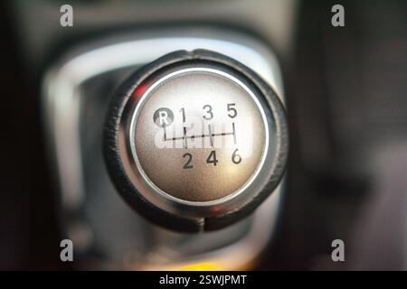 Close up of a six speed manual gear shift knob in a vehicle Stock Photo