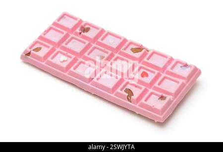 Pink craft chocolate bar with nuts isolated on white Stock Photo