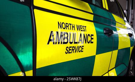 North West Ambulance Service (NWAS) Logo on Ambulance Car - Penrith Fire Station, Cumbria, England Stock Photo
