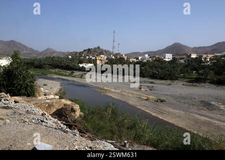 Communication Tower and Village by Wadi Fanja - Al - Hadith, Fanja Oman Stock Photo