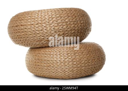 Two stylish wicker poufs on white background Stock Photo