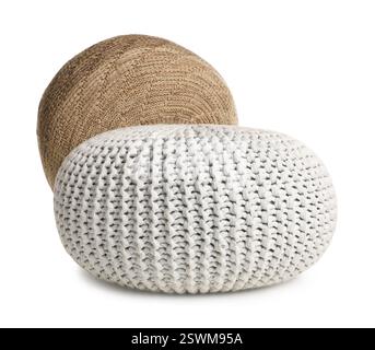 Different stylish knitted poufs on white background Stock Photo