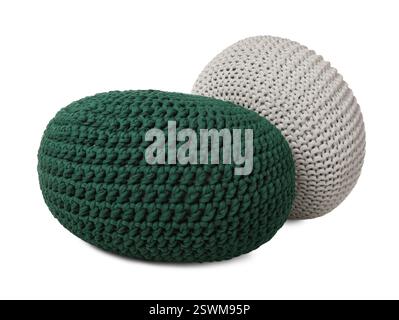 Different stylish knitted poufs on white background Stock Photo
