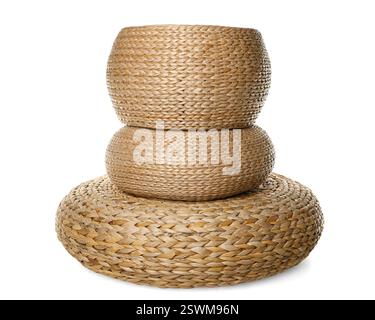 Three stylish wicker poufs on white background Stock Photo