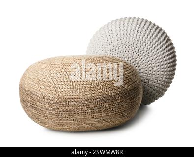 Different stylish knitted poufs on white background Stock Photo