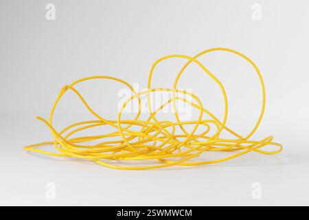 Insulated yellow electrical wire isolated on white Stock Photo