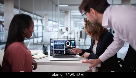 Diverse Team Analyzing Customer Data On Virtual Analytics Dashboard  Financial Analysts Collaborating On Predictive Analytics Stock Photo