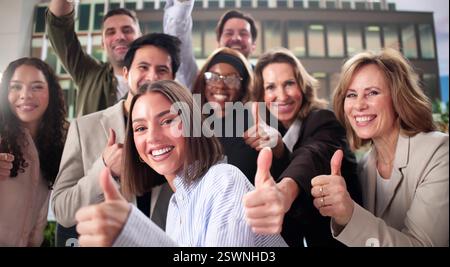 Successful Multiracial Business Team Celebrates Together, Supportive Thumbs Up Stock Photo