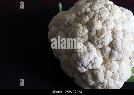 Fresh broccoli isolated on a black background. Healthy and vegetarian food. Copy space. Stock Photo