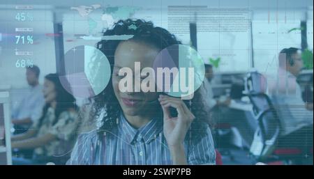 Image of data processing over african american businesswoman using phone headset in office Stock Photo
