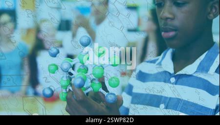Holding molecular model, child studying science over mathematical equations image Stock Photo