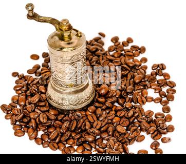 Glass Hourglass Timer with Black Sand Surrounded by Roasted Coffee Beans on a White Background Stock Photo