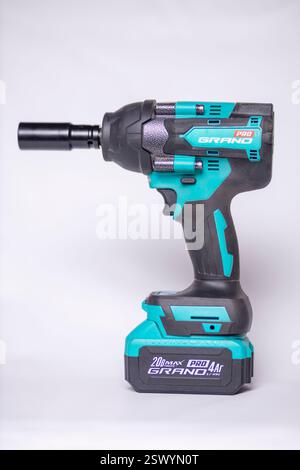 Professional impact wrench with battery isolated on a white background, ready for demanding tasks Stock Photo