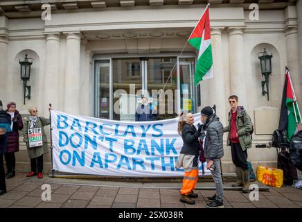 Brighton, Sussex, UK. 22nd Feb, 2025. Pro Palestinian supporters (Palestinian Support Campaign) gather outside Barclays Bank, Brighton. Those there were voicing their anger at the banks financial involvement with Israel. This comes just days after the bodies of 2 Israeli children and their mother were returned to Israel following their kidnap during the 7th October 2023 insurgence into Israel by Hamas. Credit: Newspics UK London/Alamy live News Stock Photo