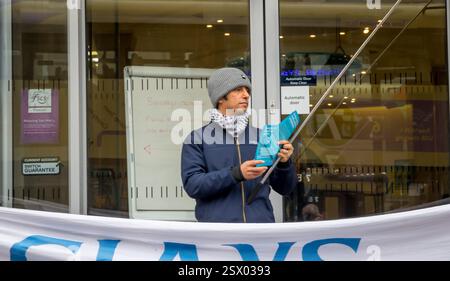 Brighton, Sussex, UK. 22nd Feb, 2025. Pro Palestinian supporters (Palestinian Support Campaign) gather outside Barclays Bank, Brighton. Those there were voicing their anger at the banks financial involvement with Israel. This comes just days after the bodies of 2 Israeli children and their mother were returned to Israel following their kidnap during the 7th October 2023 insurgence into Israel by Hamas. Credit: Newspics UK London/Alamy live News Stock Photo
