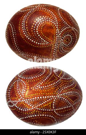 Two large isolated on white background Easter eggs with ornamental pattern, view from different angles. Stock Photo