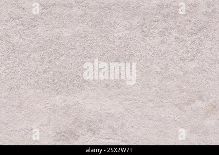 Neutral grey stone texture. Full frame, seamless, repeating background, pattern or template. Stock Photo