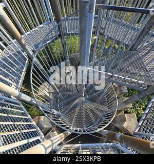 Aerial view of a beautifully designed spiral metal staircase highlighting its artistic features Stock Photo
