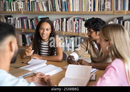 Multinational high school or university students engaged in exam preparation Stock Photo