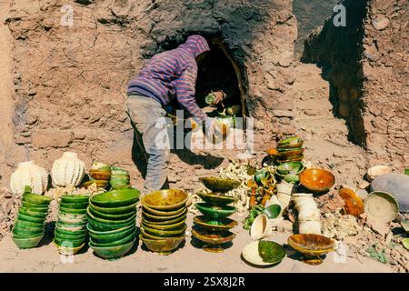 Tamegroute, a Moroccan village and gateway to the Sahara, is known for its unique pottery, made from local clay and fired in communal kilns. Stock Photo