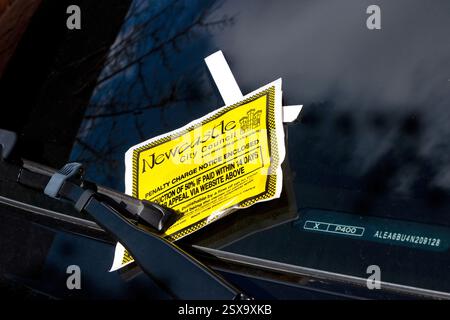 british yellow parking ticket or PCN under windscreen wiper newcastle upon tyne uk Stock Photo