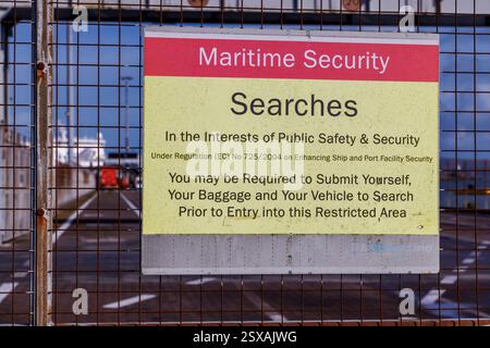 Maritime security sign stating searches may be made, Fishguard ferry terminal, Wales, UK Stock Photo