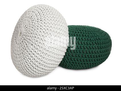 Different stylish knitted poufs on white background Stock Photo