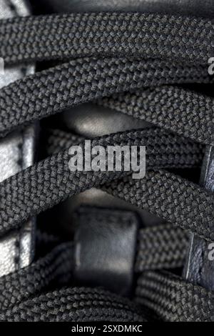 a piece of natural leather shoes with laces for fixing, new shoes and flat laces Stock Photo