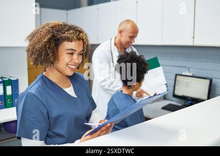 Team of Medical Professionals Collaborating in a Clinical Environment Stock Photo