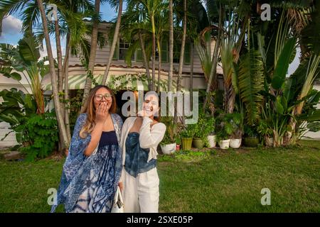 Nepalese visitors in front of Miami home Stock Photo
