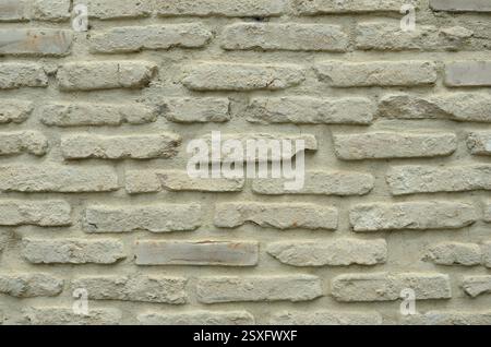Ancient brick wall as background. Stock Photo