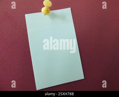 sticker pinned to the yellow button Stock Photo