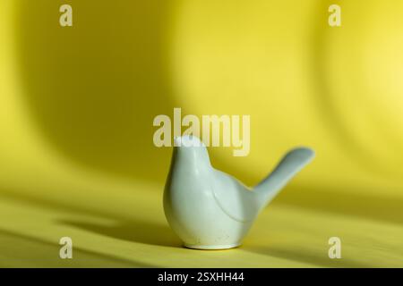 abstract image: white bird figurine on a soft background. symbol of spring and tenderness Stock Photo